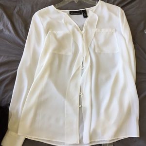 Nice button down blouse. New with tags.